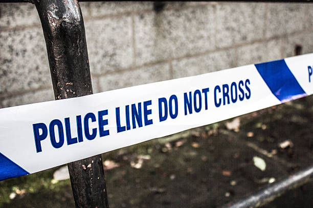 istock Police Tape Evidence 502415378