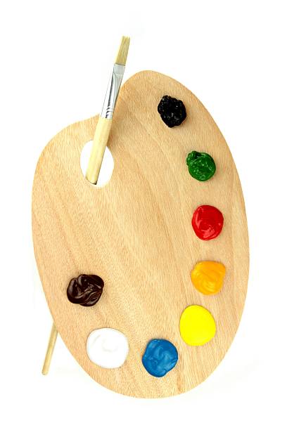 istock Paint brushes, colors and pallet 502415597