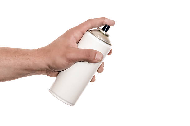 Holding a Spray Paint Can stock photo