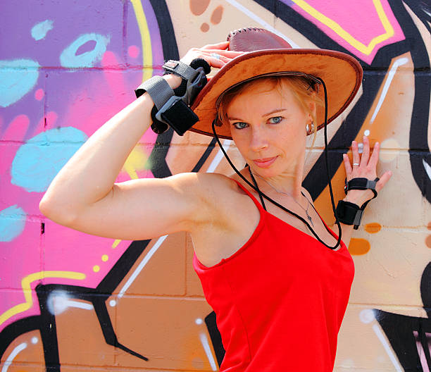istock Woman with roller skate protections and hat 502418103
