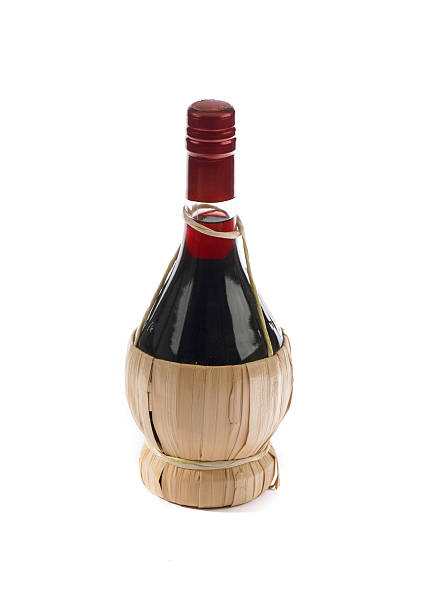 istock flask of red wine in the foreground 502419646