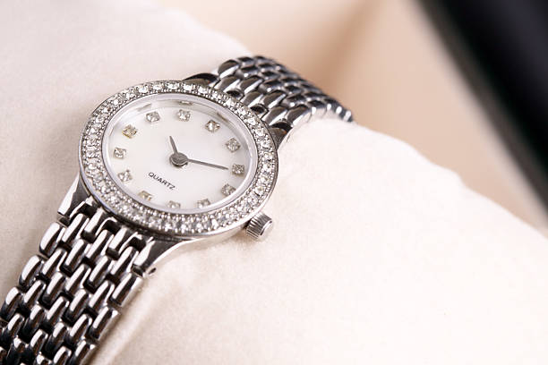 lady uhr - checking the time watch women looking stock-fotos und bilder