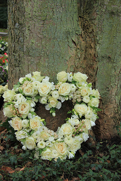 istock Heart shaped sympathy flowers 502421501