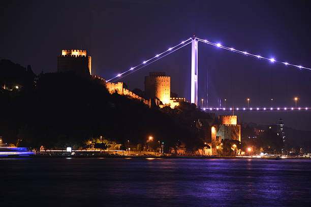Castle by Bhosphorus A castle by bhosphorus bridge at night in Istanbul bogaz stock pictures, royalty-free photos & images