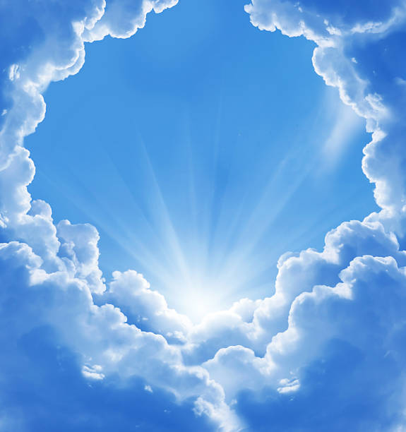 istock blue sky with sun and beautiful clouds 502422817