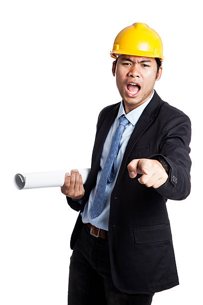 istock Asian engineer man is angry shout and point to camera 502423035