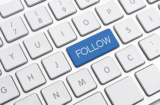 istock Follow me sign on computer keyboard 502423796