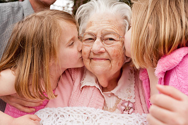 대한 grandma kisses - grandmother senior adult child baby 뉴스 사진 이미지