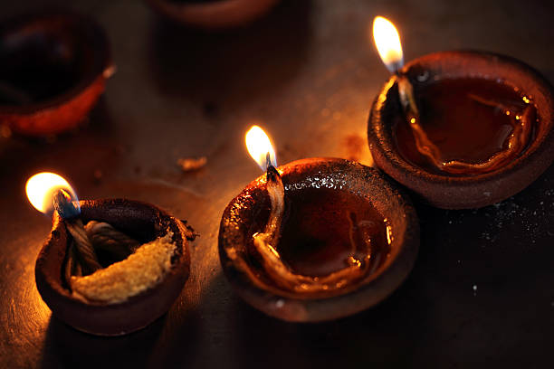 Coconut oil lamps Coconut oil lamps in kapaleeswarar temple, chennai ,India. kapaleeswarar temple photos stock pictures, royalty-free photos & images
