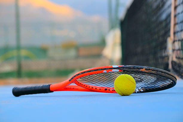 istock tennis ball and tennis racket 502445372