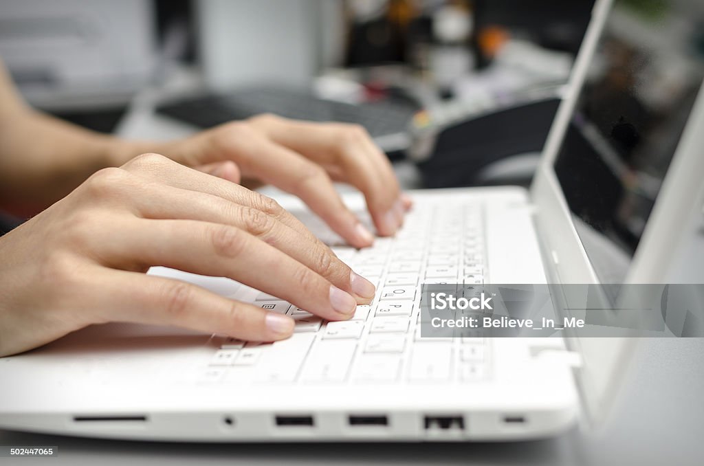 Fingers on the laptop keyboard Close up fingers on the laptop keyboard Adult Stock Photo