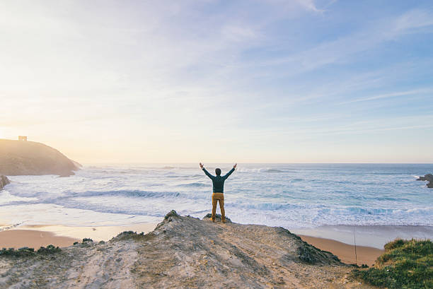 istock Young man at the sea 502449368
