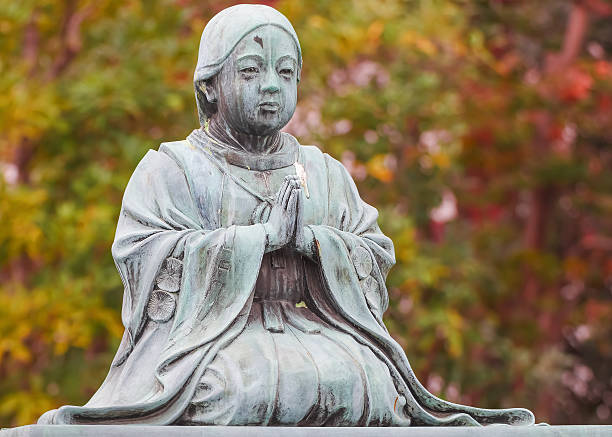 Tokyo, Japan - November 25 2013: A Priestess Statue situated in front of the main hall of Zojoji Temple
