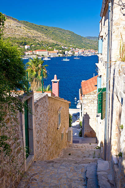 istock Narrow streets of Vis island vertical view 502450912