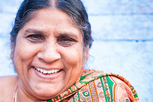 Jodhpur, Rajasthan, India - March 4, 2015. Portrait of a smiling Indian woman along the street in Jodhpur, India.