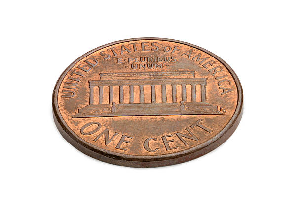 istock U.S. one cent coin isolated on white background. macro shooting 502452597