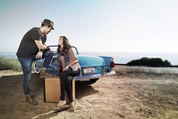 istock Couple Waiting by  a Blue Convertible 502452618