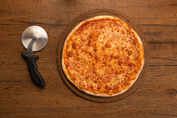 istock margherita pizza with a pizza knife 502452778