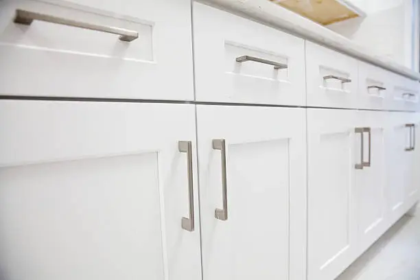 Photo of White kitchen cabinet