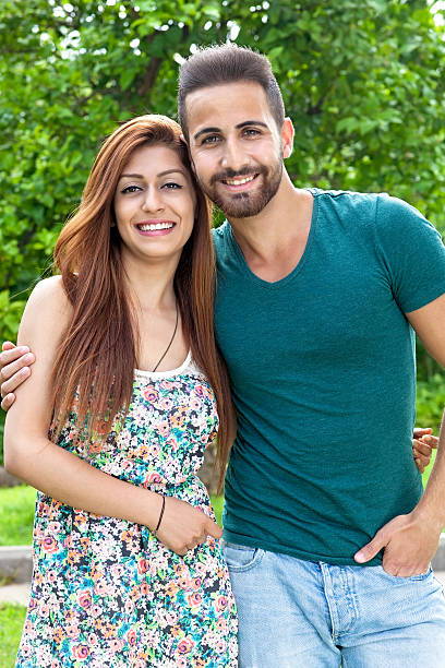 istock Affectionate couple standing arm in arm. 502454163