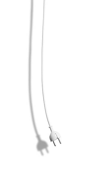 Hanging white electric cable with shadow isolated on white background Studio photo of drooping white electric cable with shadow isolated on white background two pin plug stock pictures, royalty-free photos & images