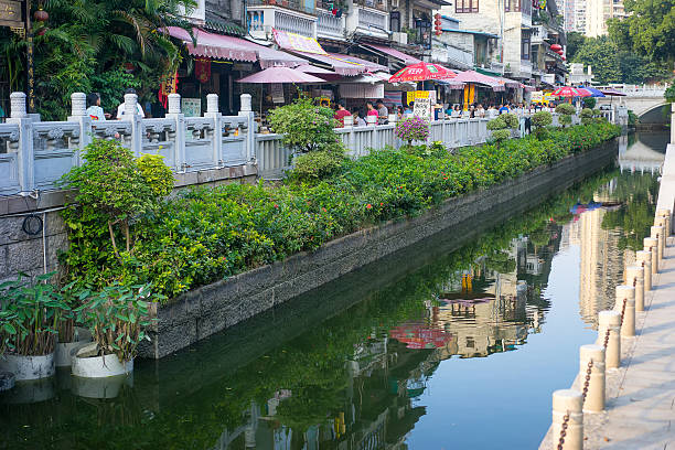 Guangzhou, China-Oct. 24, 2015: Old buildings by Litchi Bay.Along the Litchi Bay there are many historical relics and local shops, now it's a famous tourist attraction in Guangzhou.