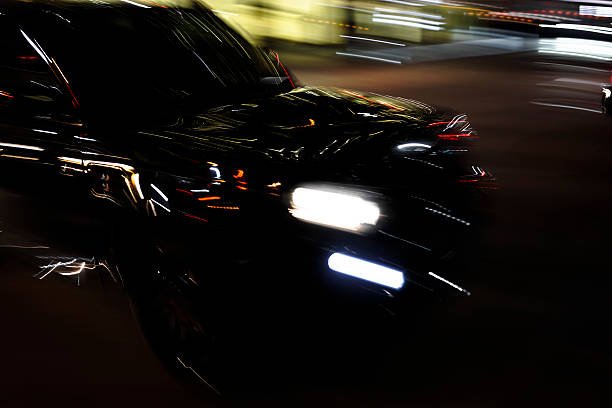 istock Black car in the night 502460322