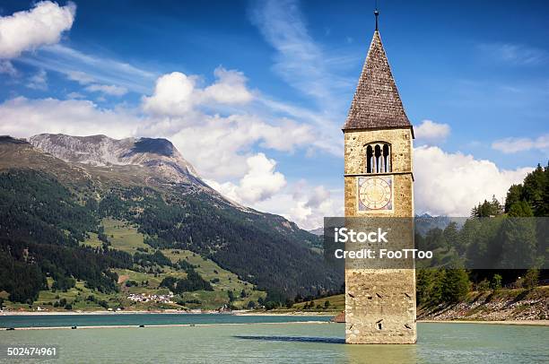 Reschenpass Stock Photo - Download Image Now - Adige River, Bell Tower - Tower, Blue