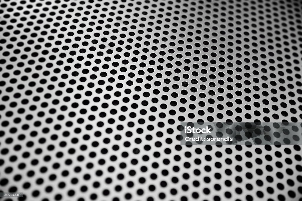 Perforado superficie de metal - Foto de stock de Abstracto libre de derechos