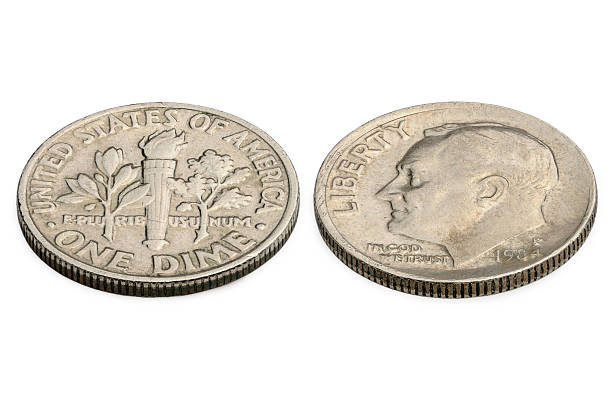 istock U.S. ten cents coin isolated on white background. macro shooting 502475223