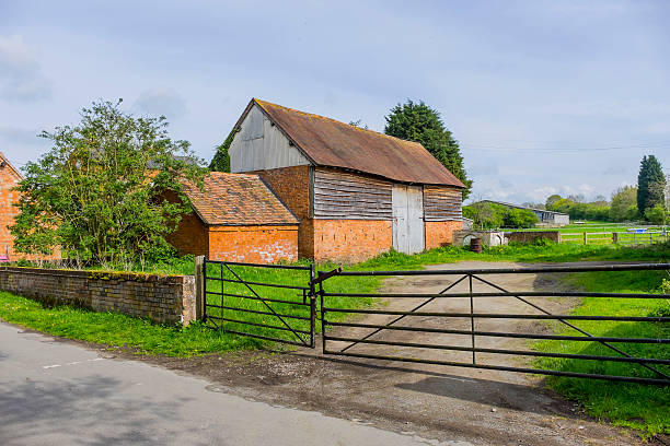 barn a barn on a farm in the uk battery hen stock pictures, royalty-free photos & images