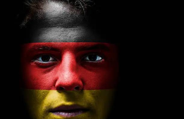Photo of deutschland, deutsch flag. Germany, German flag on face