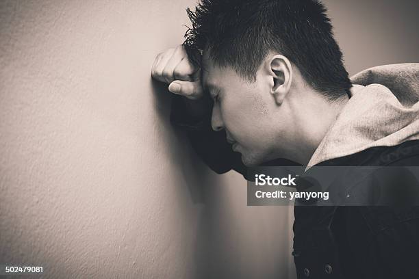 Depressed Asian Man Stock Photo - Download Image Now - Adult, Anger, Anxiety