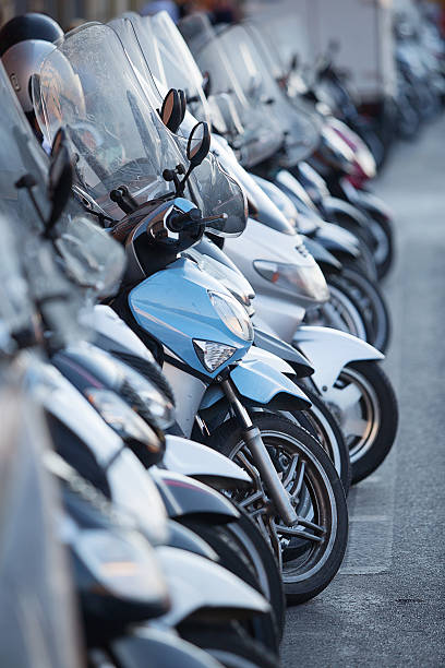 istock Row of parked Motor Scooters 502482278