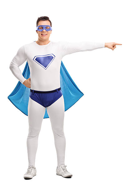 istock Young superhero pointing with hand 502484636