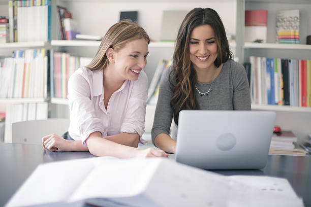 istock Female colleagues working together 502486302