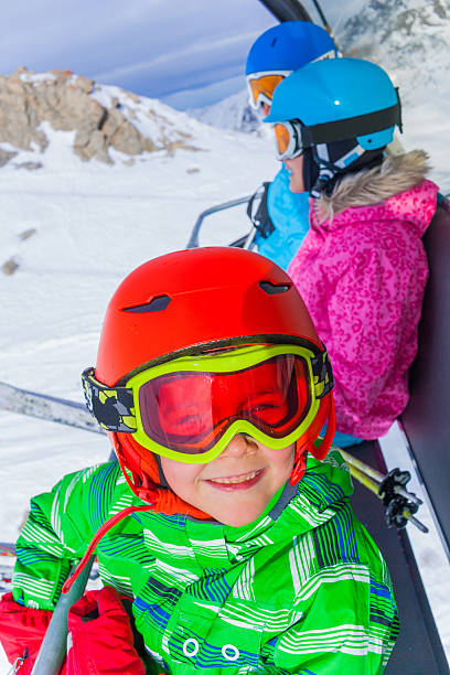 istock Little skier on ski lift 502488970