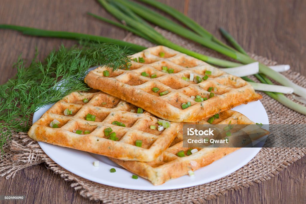 Waffles with fresh herbs and cheese Waffle Iron Stock Photo