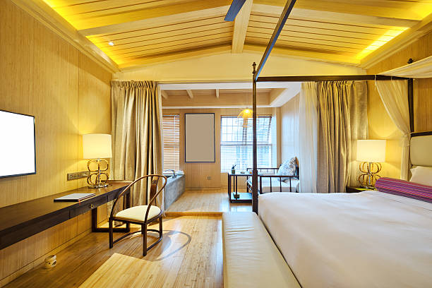 istock interior of modern bedroom with comfortable bed and sofa 502491180