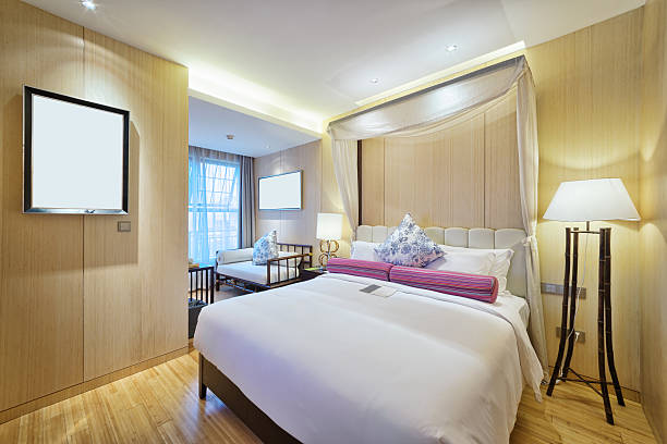 istock interior of modern bedroom with comfortable bed and sofa 502491420