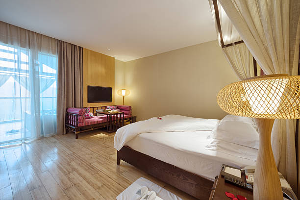 istock interior of modern bedroom with comfortable bed and sofa 502491980