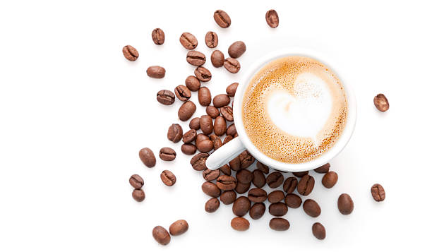 Small cup of cappuccino with coffee beans Small cup of cappuccino with coffee beans and heart shaped milk foam, top view isolated on white background cappuccino coffee froth milk stock pictures, royalty-free photos & images