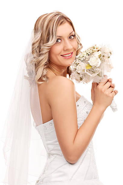 istock Young bride holding a wedding of flowers 502495244