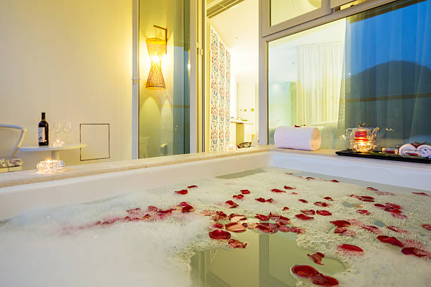 istock interior of bathroom with bathtub with rose 502495454