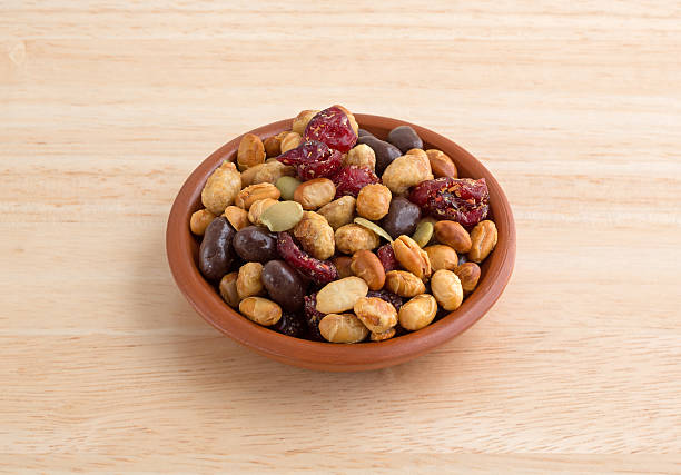istock Soybean cranberry trail mix in small bowl on table 502496316