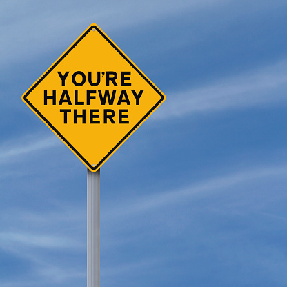 A road sign indicating You're Halfway There
