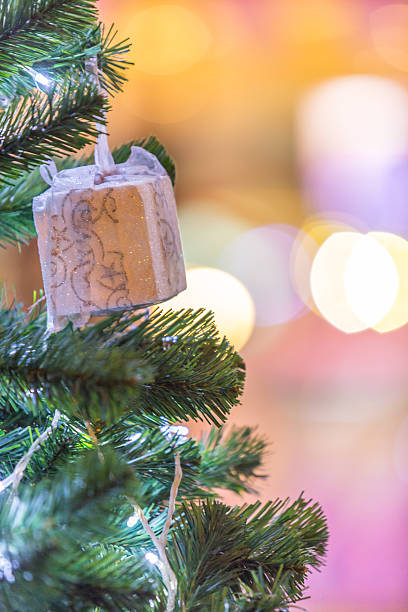 istock christmas tree and decorations on color bokeh background 502514424
