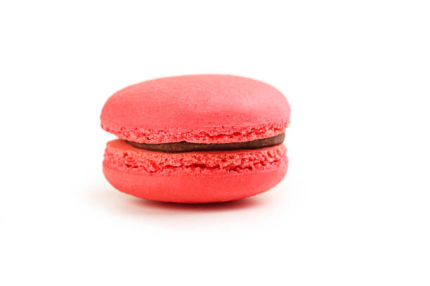 istock Tasty red macaron isolated on white 502515378