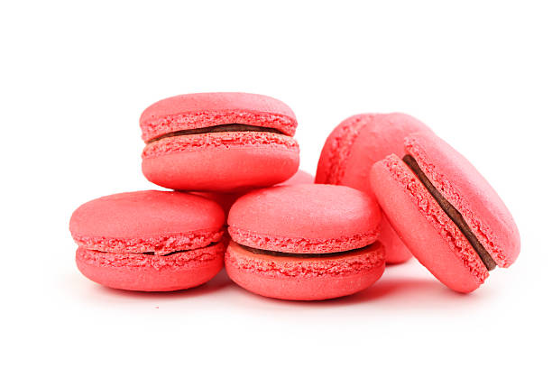 istock Tasty red macarons isolated on white 502515534