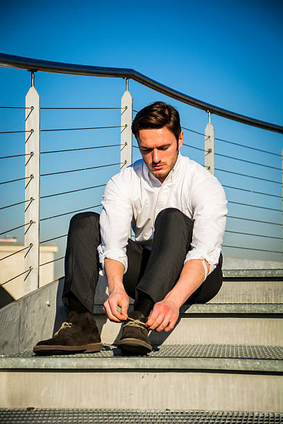 istock Handsome trendy man sittiing on stairs, outdoor 502516976